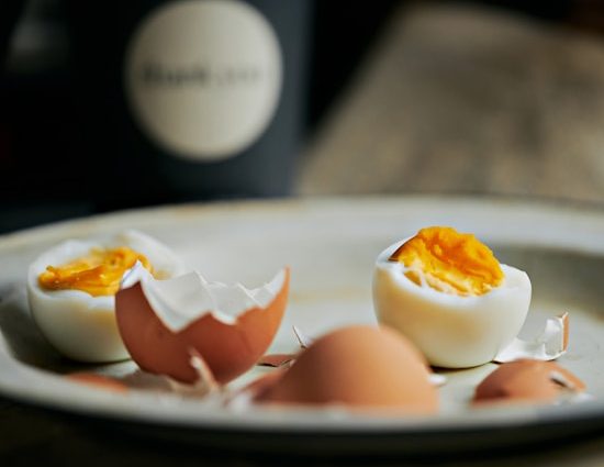 Cooked eggs on a plate.